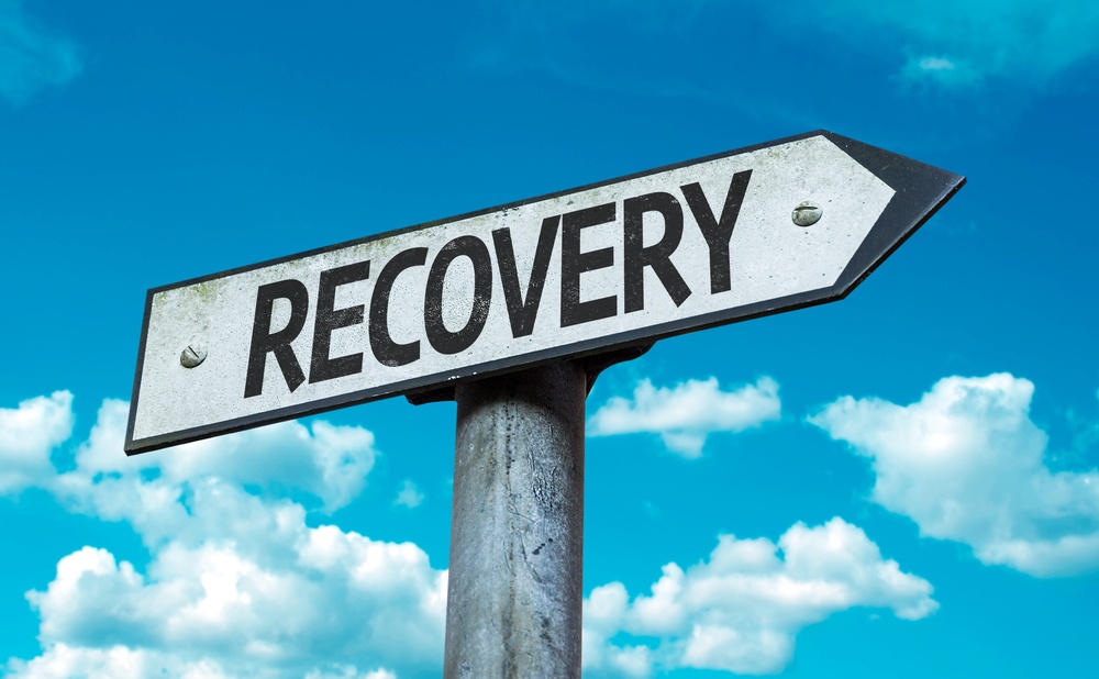 Recovery sign with sky background.jpeg